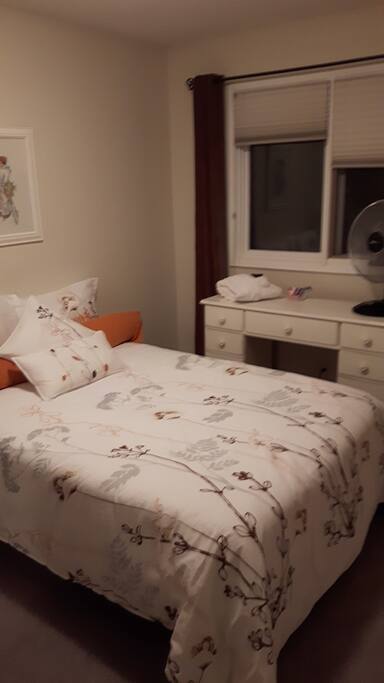 Comfy bed accommodates two.