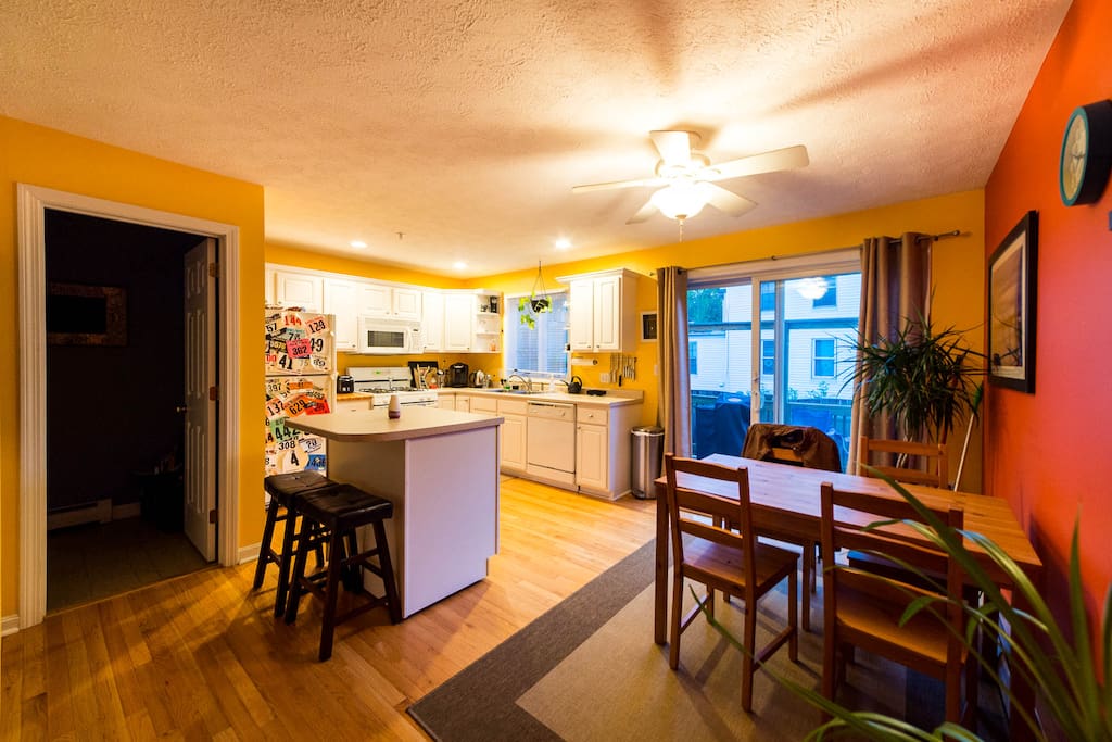 Kitchen and half bath with small back deck for grilling and relaxing outside