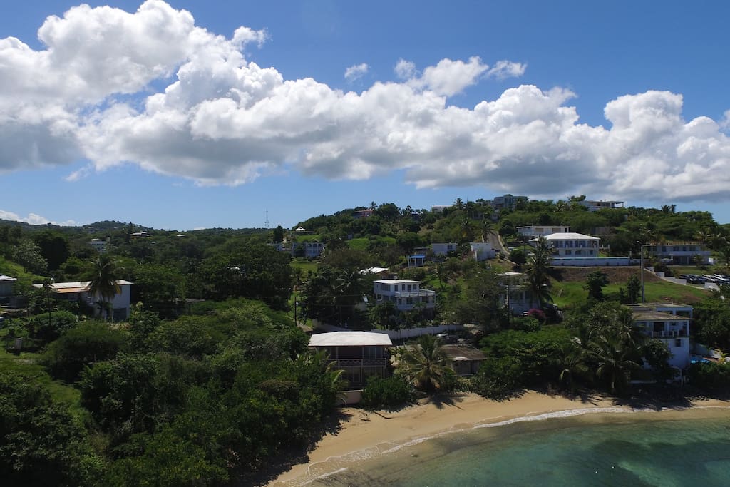 CASA ARENA GUESTHOUSE (white building, far right on shore)