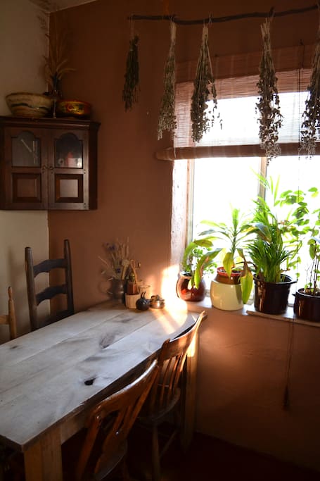 Cozy kitchen; hand made solid wood table.