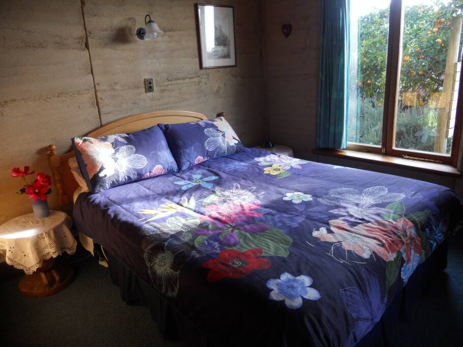 Rammed earth apartment bedroom