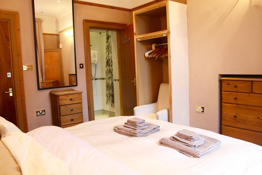Bed room and private bathroom entrance