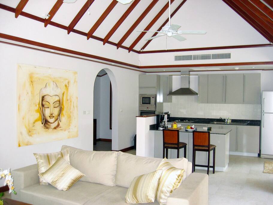 Open plan living area with fully equipped kitchen