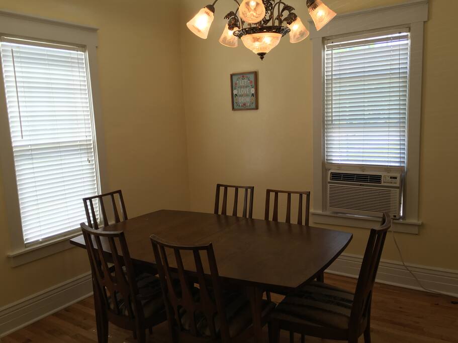 Beautiful Dining Room with a table that seats up to 8-12 people.