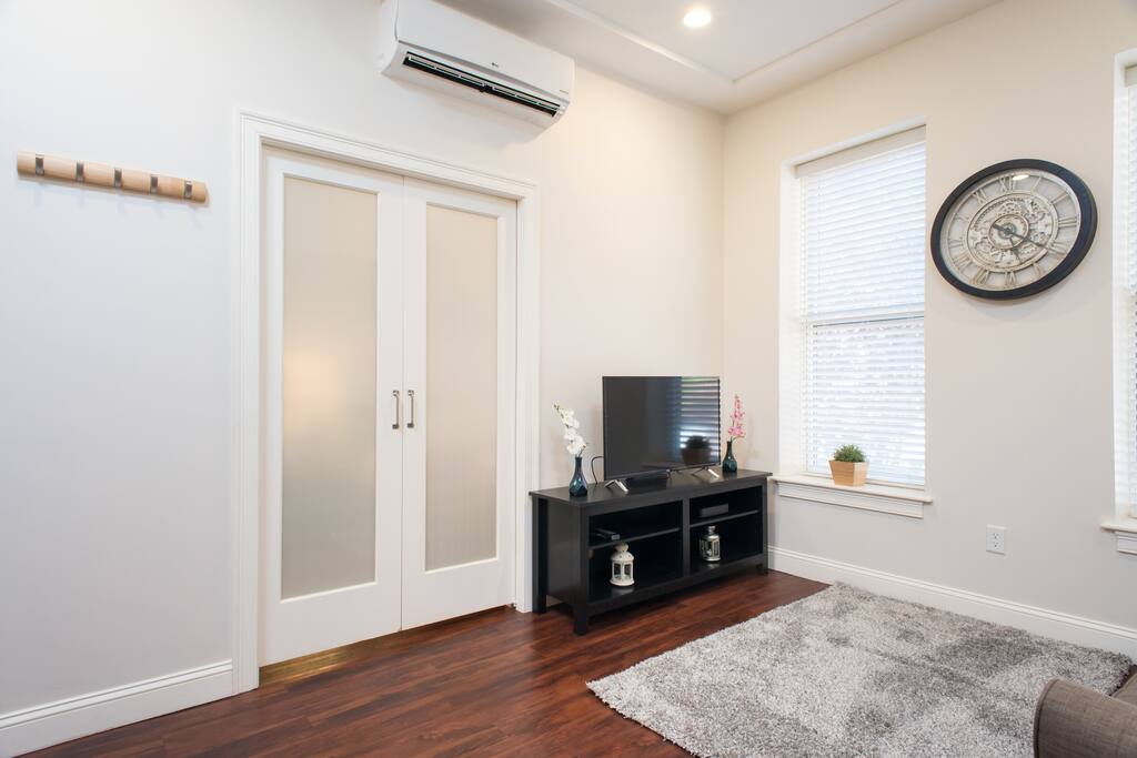 Sliding door for privacy if you have guests using the living room sofa.