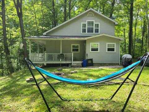Cheerful 3-bedroom, 2 full-bath cottage with DNR launch lake access on Chippewa Lake.