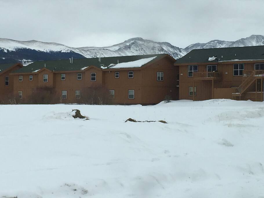 View of the back of our complex, adjacent to open space, with Continental Divide to the Southeast