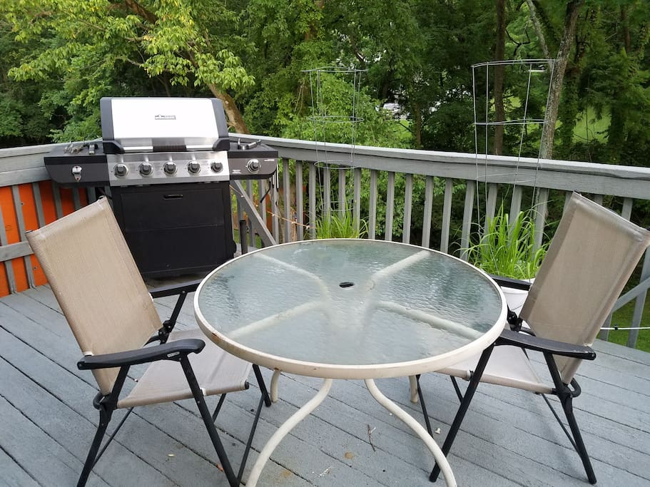 Outdoor seating area and grill