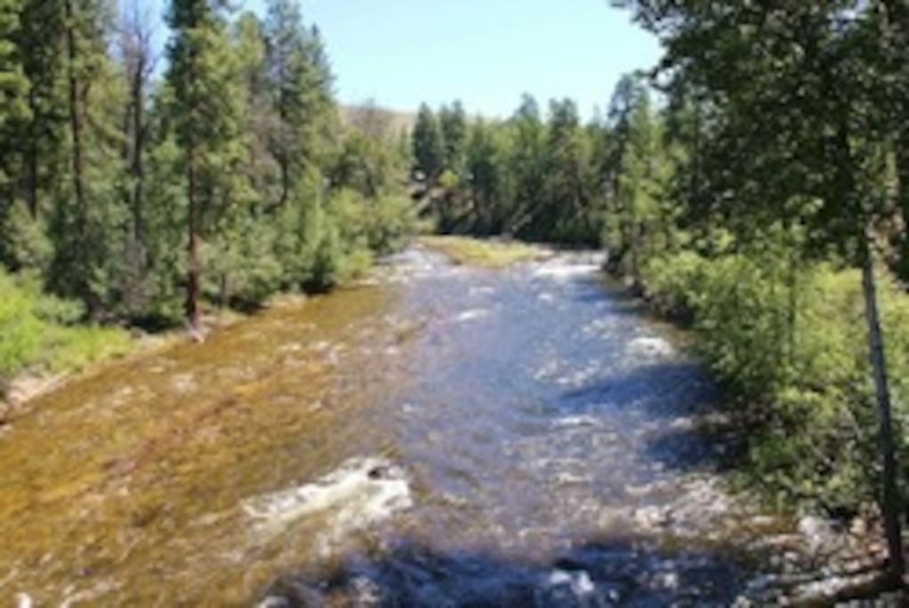 Chewuch River on site with walking bridge to park