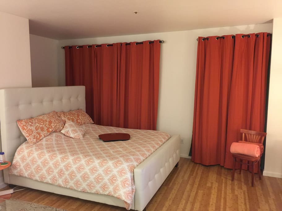 Big Eastern King Bed with leather head and footboard. It's pretty awesome.