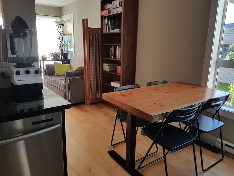 kitchen table (height can be adjusted using the electronic panel under the table by the window)