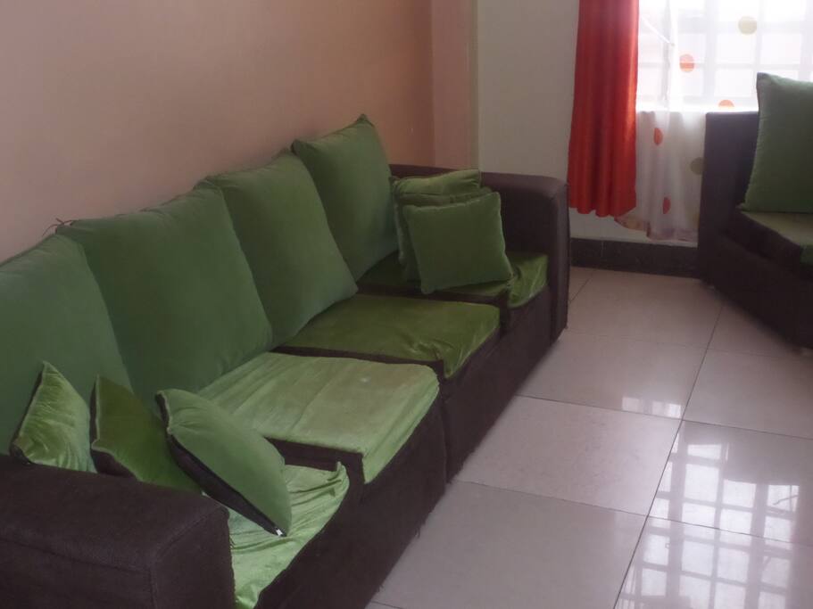 long couch that can also act as a bed for an extra person