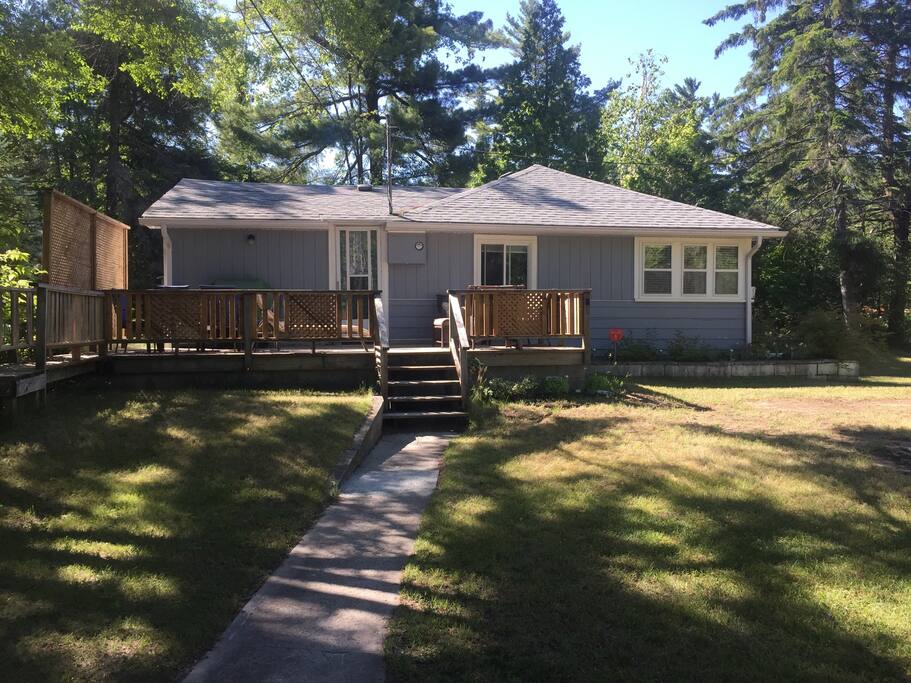 Ready for a vacation? This home has it all. Clean, well kept getaway with large deck and natural surroundings. Clothes line lets you hang your towels to dry after a long day at the beach, steps away from the property