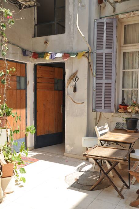 Entrance to the apartment through private garden