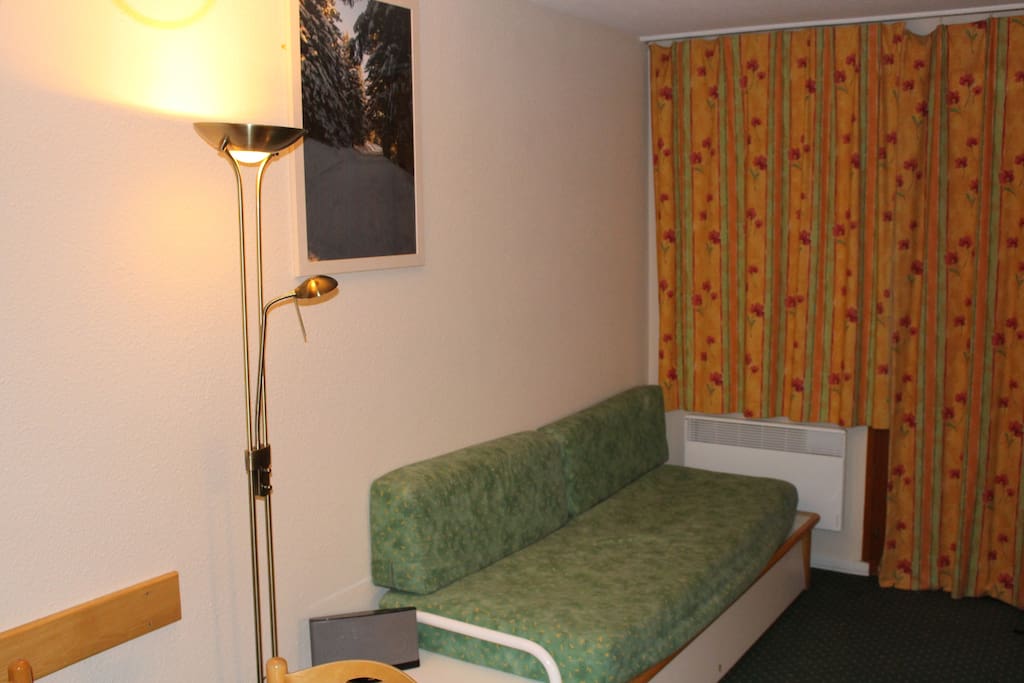 Living area showing sofa bed