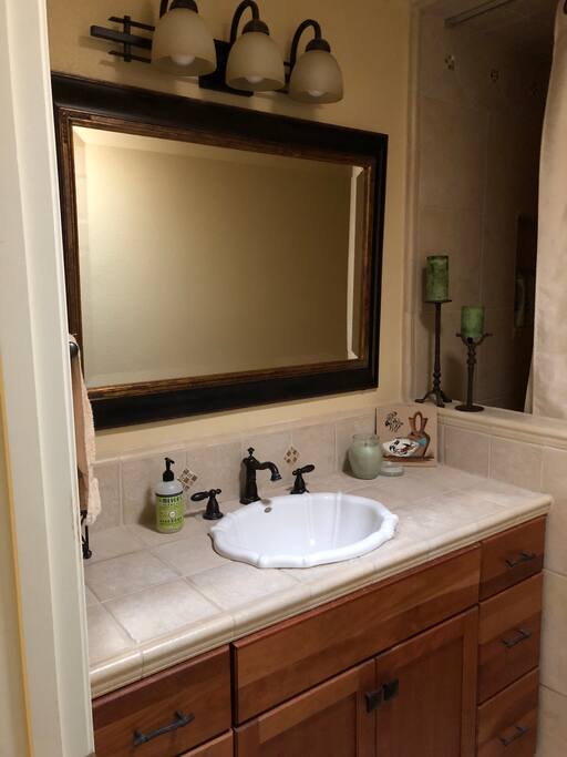 Full bathroom with shower/bathtub.