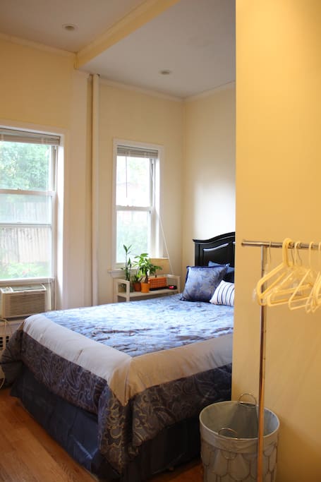 Private backyard outside- the only door in is from the bedroom- windows overlook garden