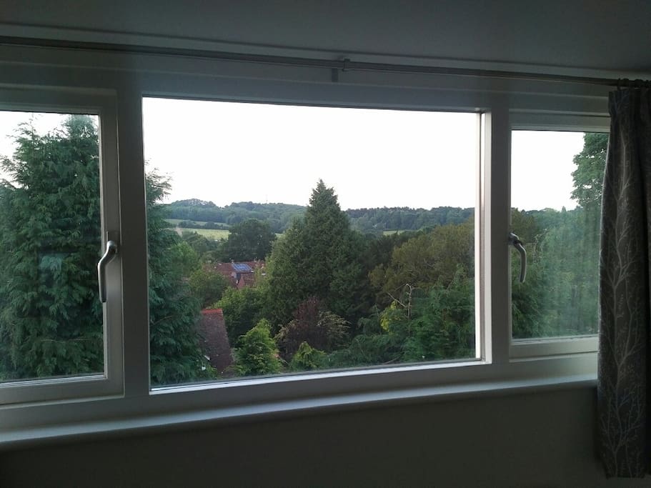 View from your bedroom across the village to Tablehurst Farm.