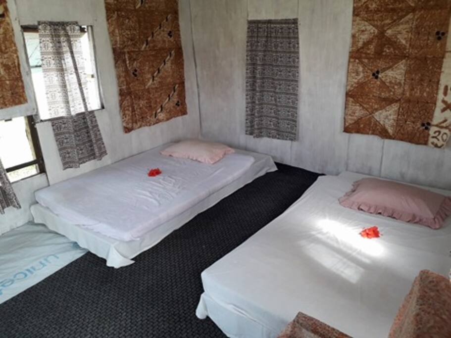 A private room which has two double beds.