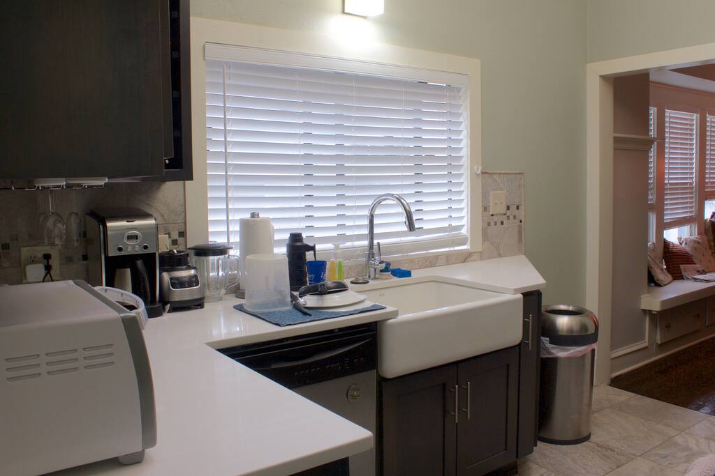 Fully furnished house includes full kitchen with pots and pans, toaster oven, coffee maker, dishwasher, refrigerator, freezer, and more. You can cook all of your own food or walk 5 minutes in any direction for food!