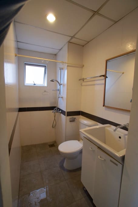 Clean bathroom with hot shower