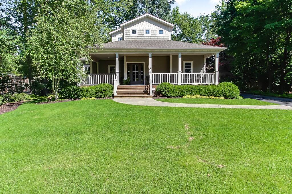 The home is nestled in a quiet wooded cul-de-sac.