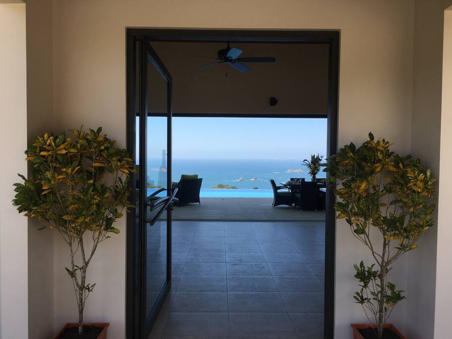 As you walk thru the front door, you see the ocean.