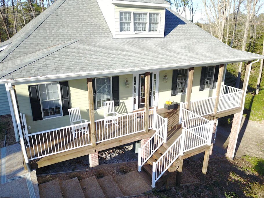 Front of home with porch to enjoy morning coffee or evening wine