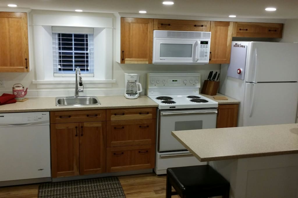A brand new kitchen with new appliances makes it even better than home.