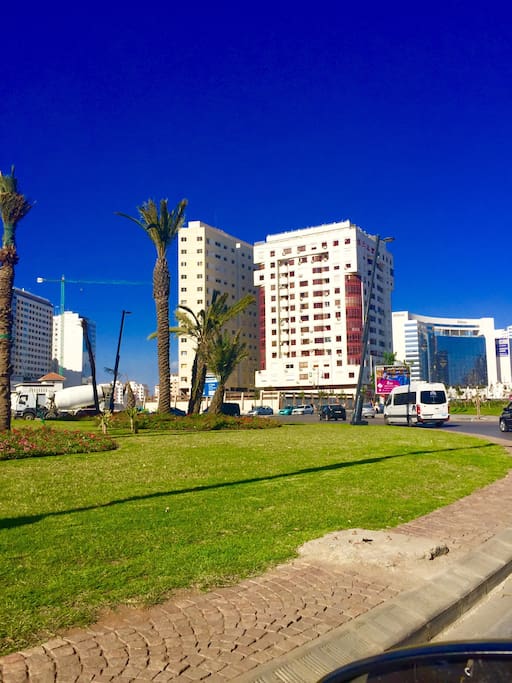 The appartment is on the sixth floor of the building with red windows