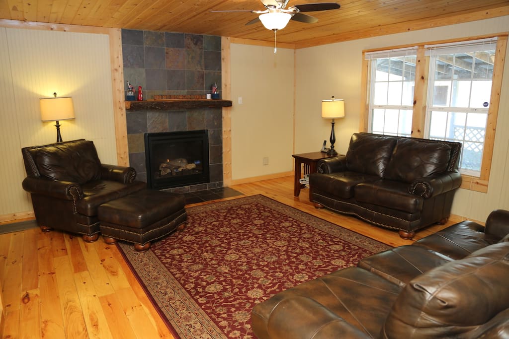 Living room and gas log fireplace from front door