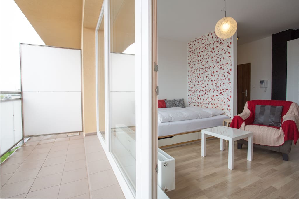 Large balcony is perfect for viewing mountains and the old town with church towers