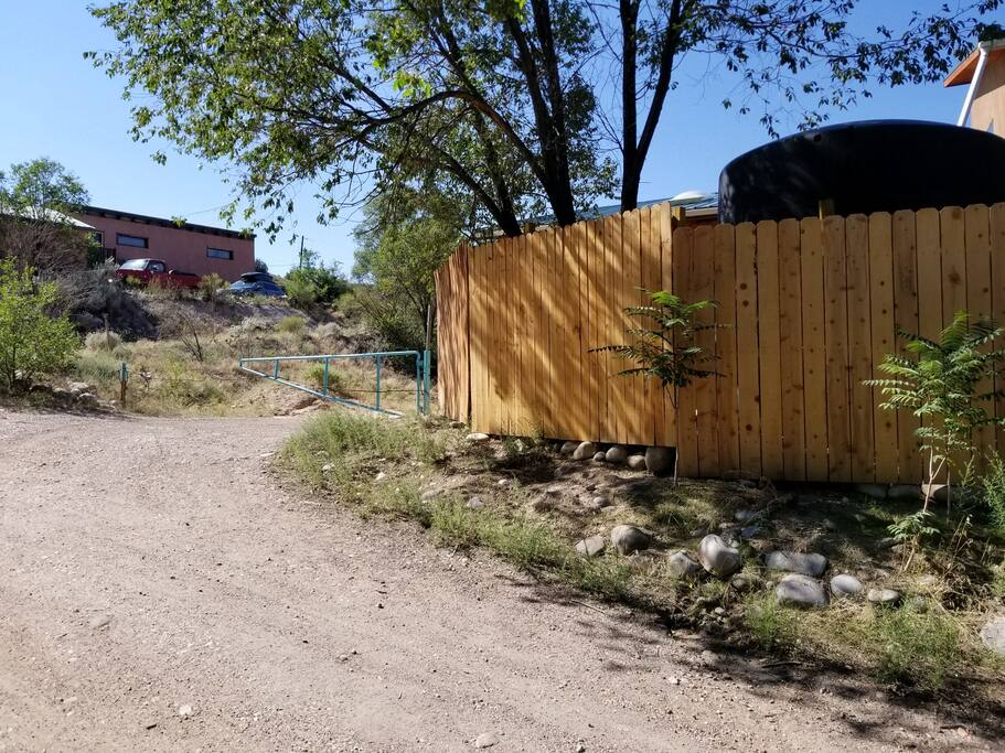 Entrance just past 3000 Gal Rainwater Collection Tank.