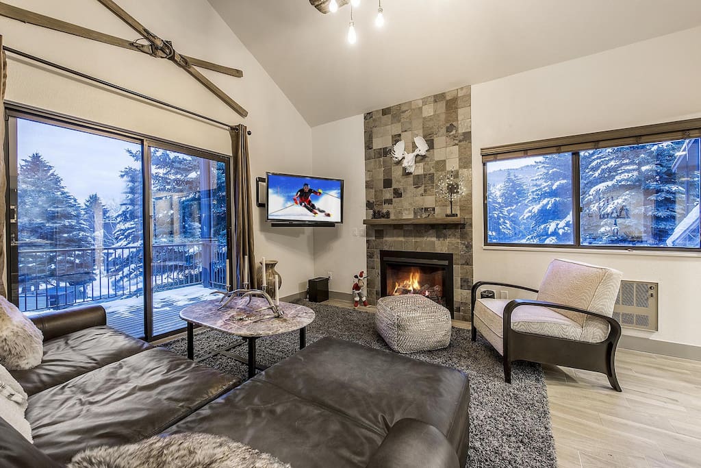 Completely remodeled unit with gas fireplace and huge plasma screen TV
