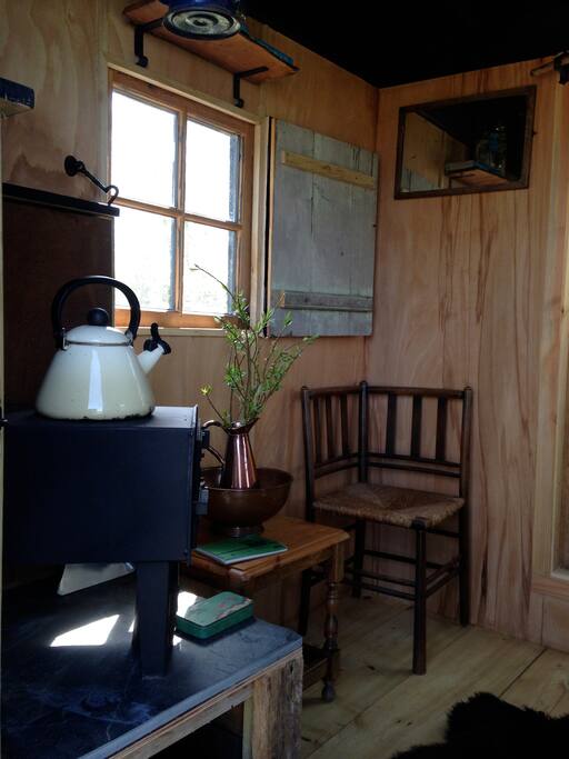 The hut is insulated and has a Norwegian wood burner
