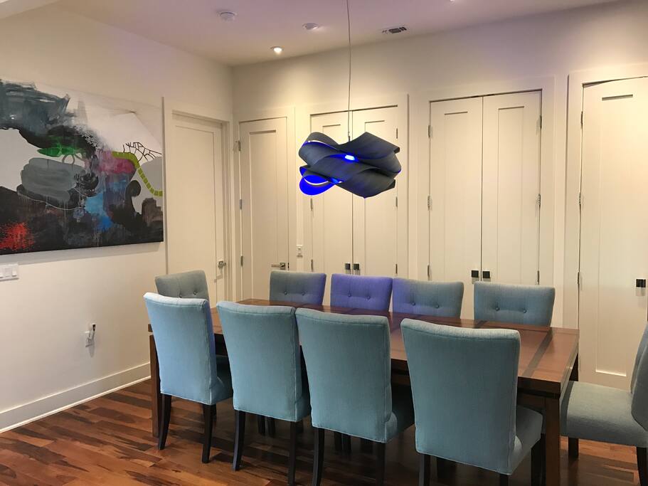 Dining room table. Lighting fixture is one piece of wood!