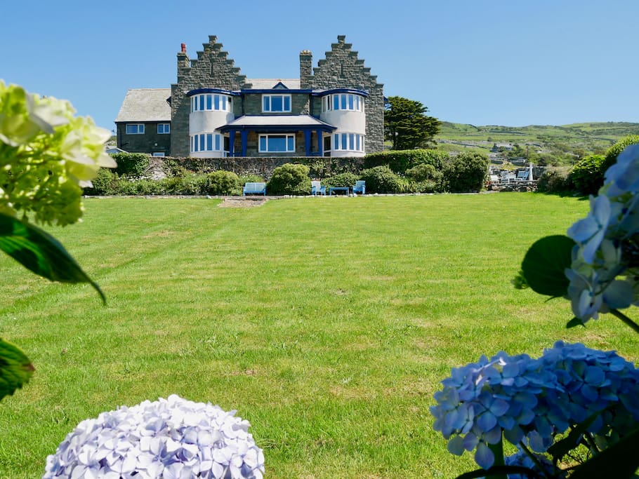 Our Beach House from the bottom of the garden - your Seaview Suite is in the bay window top left of the picture