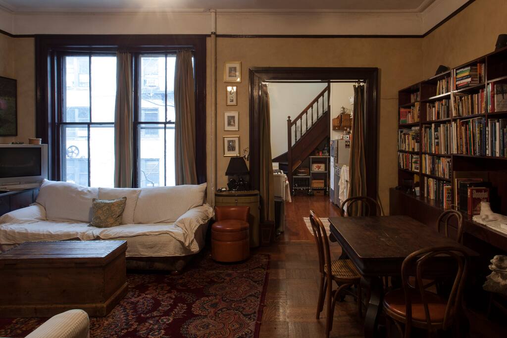 huge living room opens to kitchen and gets morning- to-midday sun
