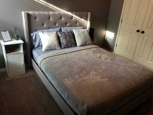 Calm Bedroom Setting with Home Gym