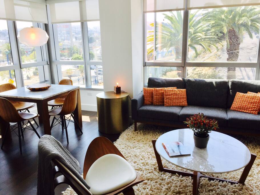 Dining and living room with views of Dolores blvd and Duboce Triangle; Italian-designed kitchen.