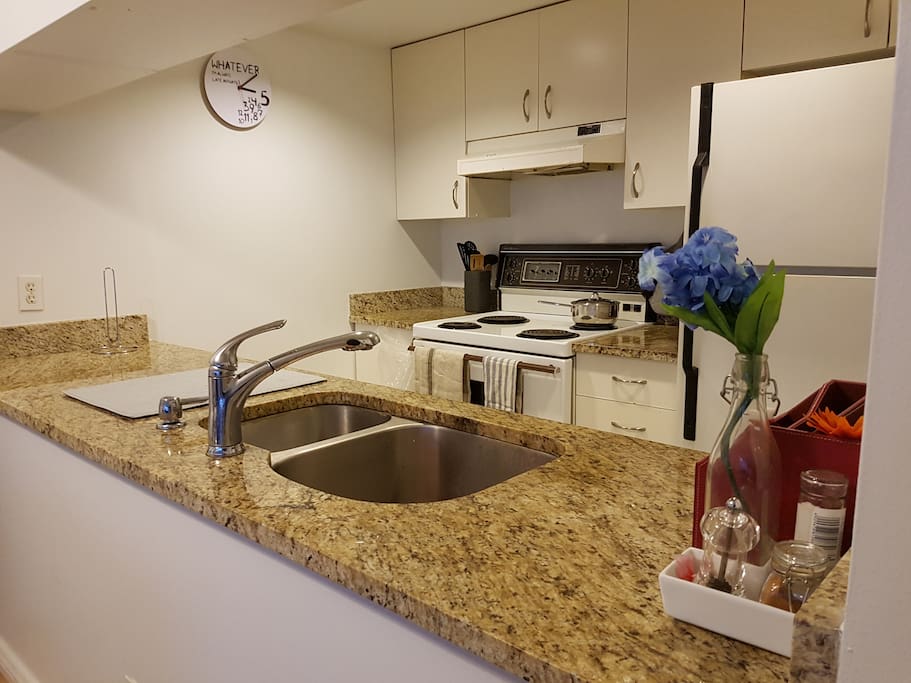 Open concept kitchen to enjoy the rest of your party while cooking