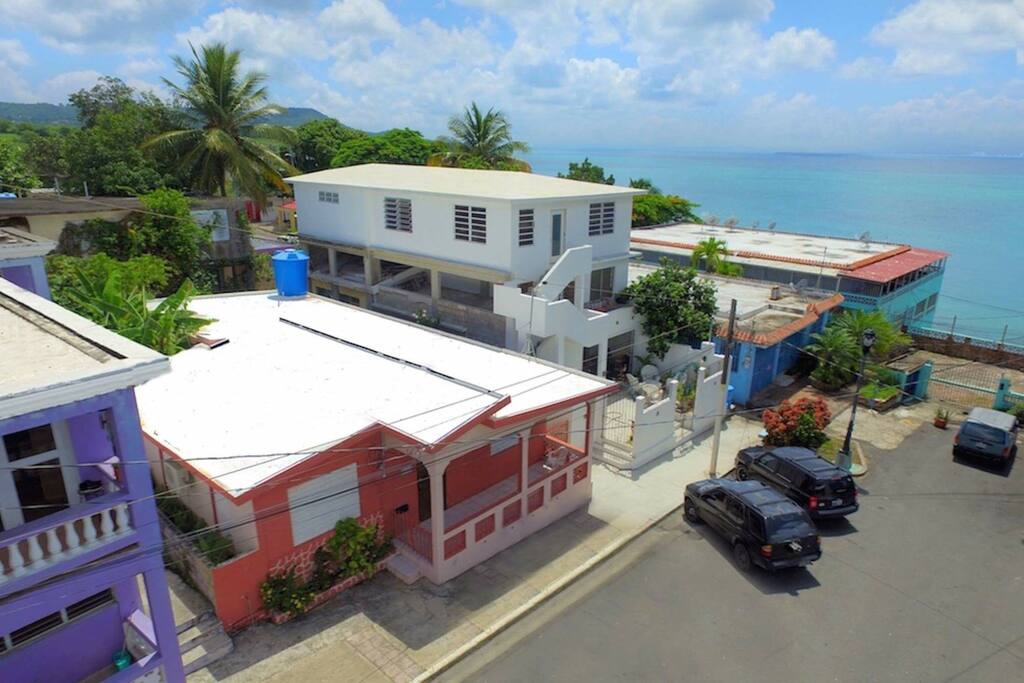 Casa Encanto is the third house from the beach, on main street in Isabel II. in between the purple house and the white house, Casa Encanto on the Caribbean.