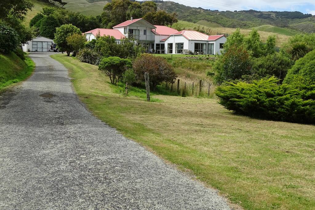 A view from the street, with the apartment attached to the right hand side of the main house.