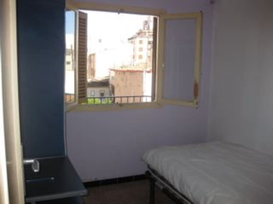 Same room, bed in different position (picture taken with smartphone)