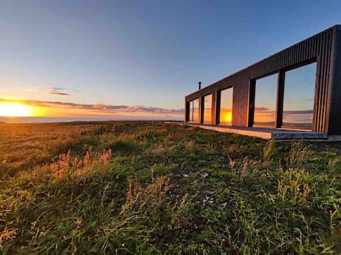 NEW! Home on the edge of the Ocean