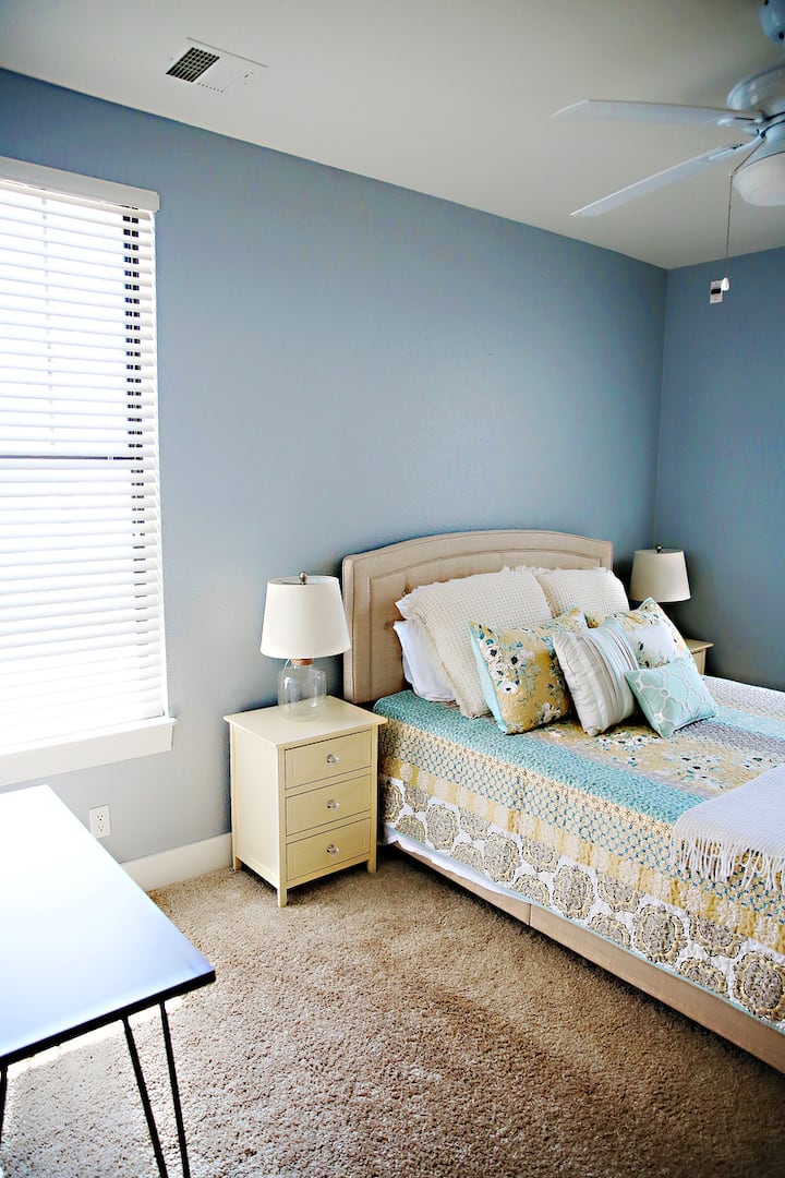 Master bedroom. With writing desk & dresser.