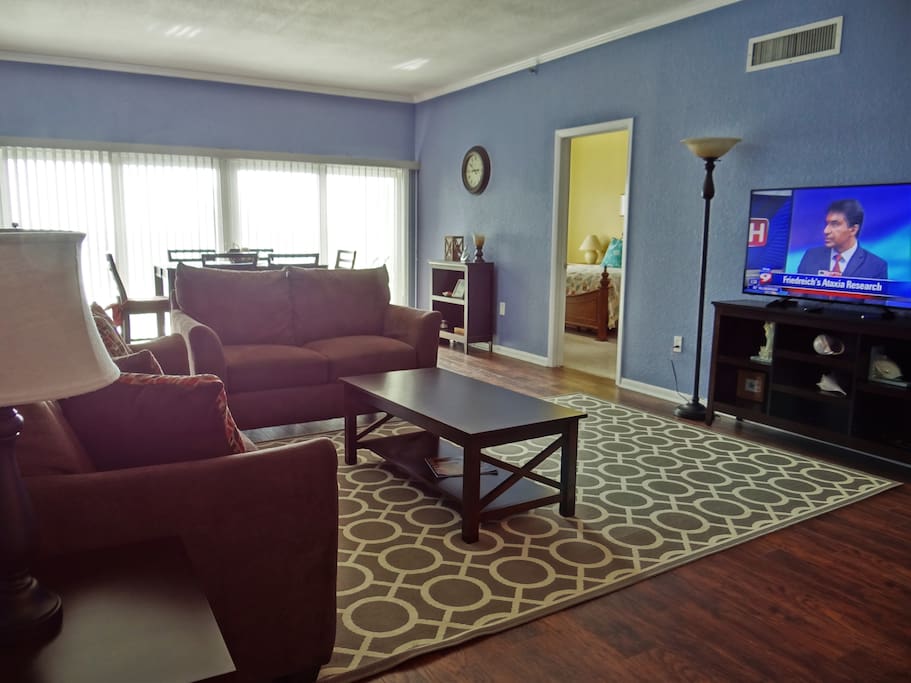Newly Furnished Living Room with large screen HD TV with Roku