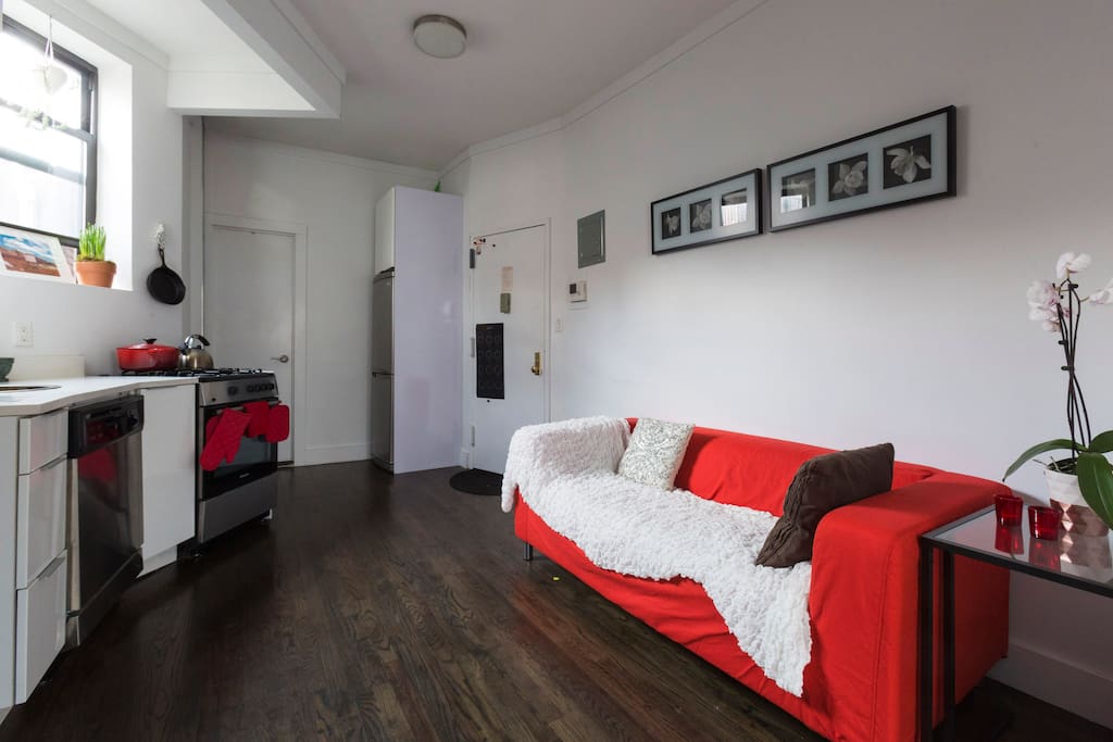 The cooking and desk space with high-ceilings and great energy