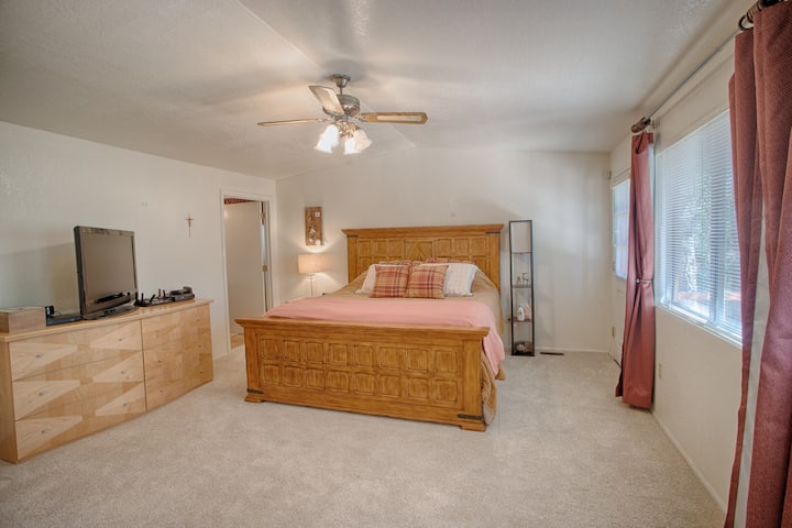 Master Bedroom has private bathroom with bath and shower and a private access deck
