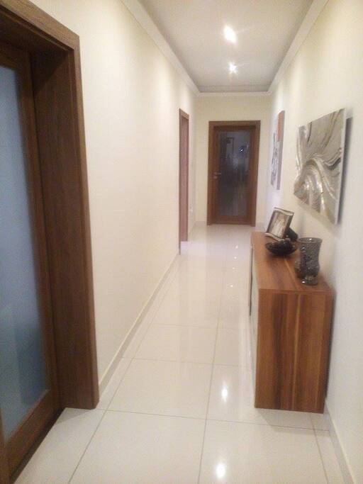 Main Corridor leading to bedrooms & kitchen & living area
